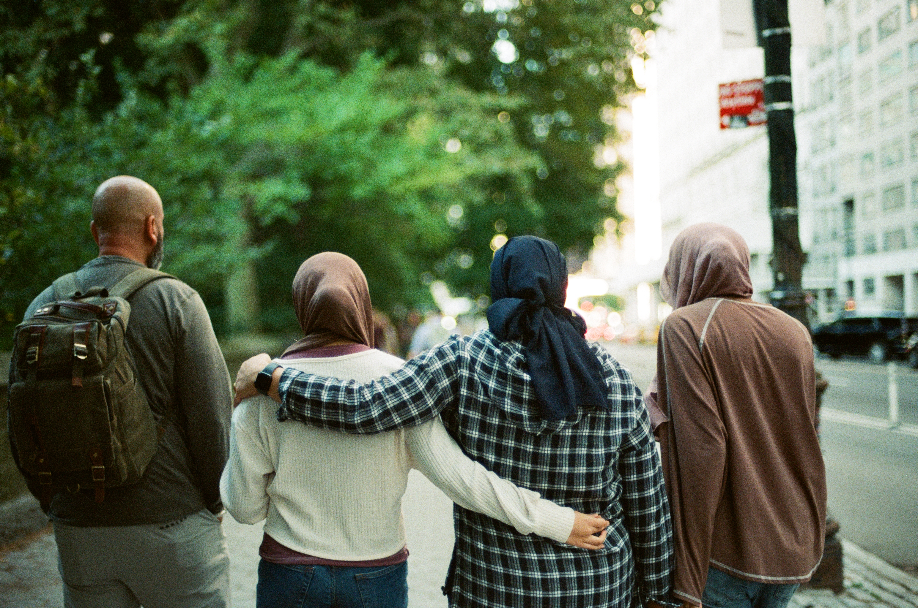 Family walking arm in arm